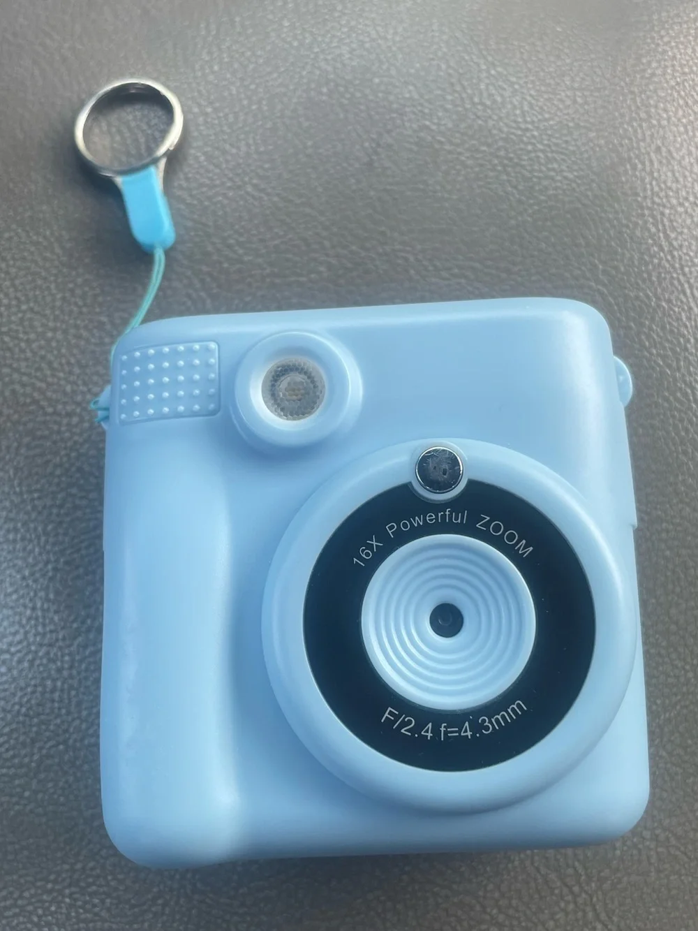 Portable Mini Digital Camera - Light Blue uses thermal paper